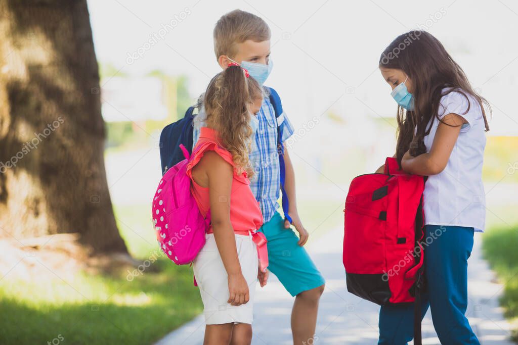 The kids happily communicate when they return to school