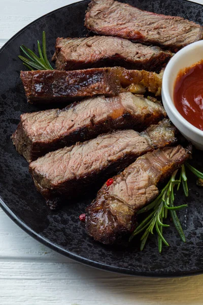 Juicy grilled meat served at barbecue party — Stock Photo, Image