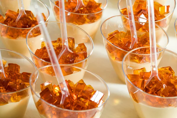 The portions of a cold caramel dessert with jelly — Stock Photo, Image