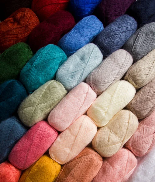 The bright threads for yarn are folded diagonally — Fotografia de Stock