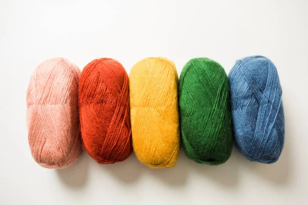 Collection of threads of rainbow color on the white background — Fotografia de Stock