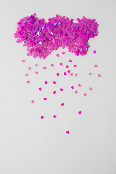 Pequenos corações cor-de-rosa no fundo, como chuva — Fotografia de Stock