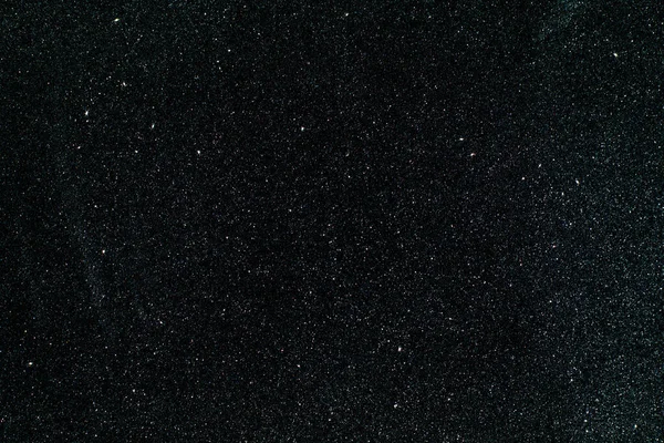 Witte sneeuw textuur op zwarte achtergrond voor overlay — Stockfoto