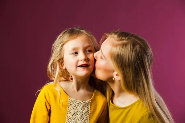 Mother and daughter in studio, happy moments — Stock Photo, Image