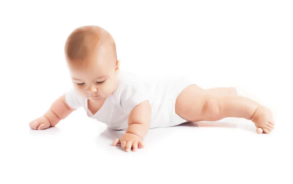 Six month old baby boy looking on the floor — 图库照片