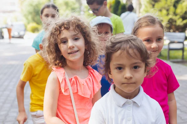 Adorable preschoolers at city park, group photo — Stock Photo, Image