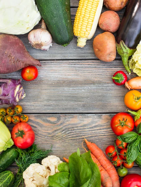 Vegetables on wooden table — Stock Photo, Image