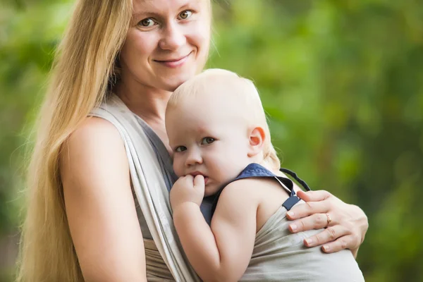 Baby in sling — Stock Photo, Image