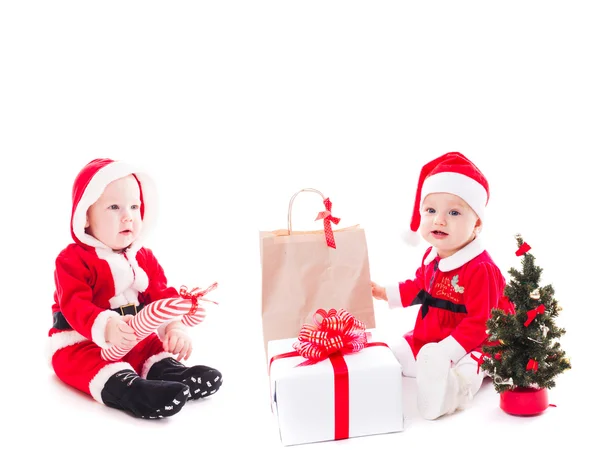 Noel baba bebek kız ve erkek — Stok fotoğraf