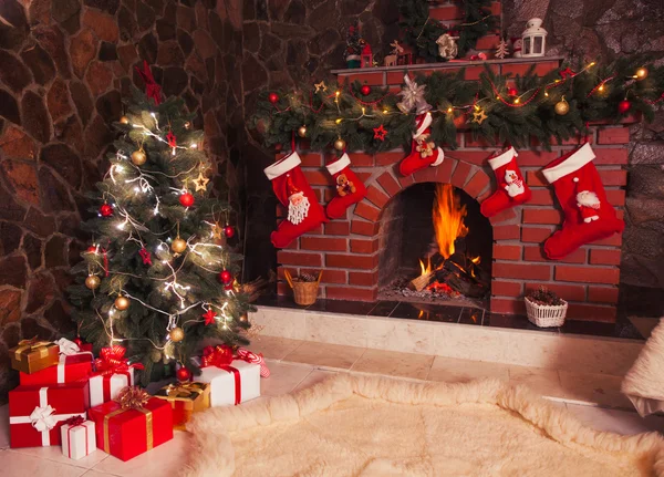 Christmas fireplace in the room Royalty Free Stock Images