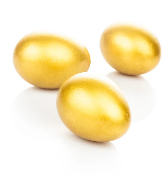 Huevos de oro aislados — Foto de Stock