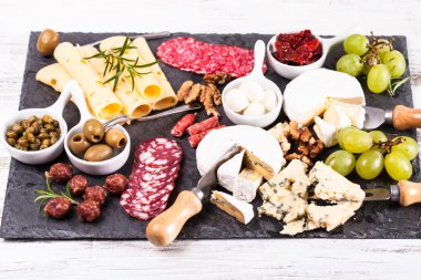 Cheese and salami plate clipart