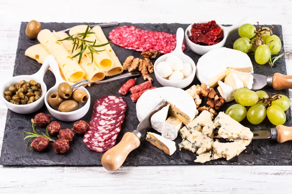 Cheese and salami plate — Stock Photo, Image