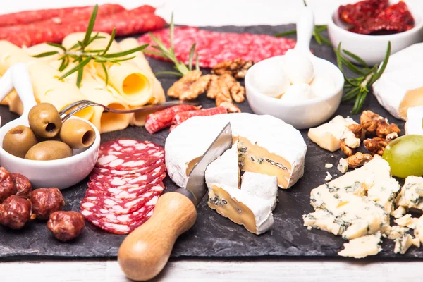 Cheese and salami plate — Stock Photo, Image