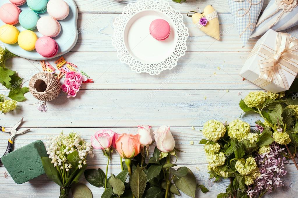 Box with flowers and macaroons