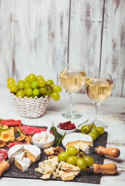 Cheese and salami plate — Stock Photo, Image