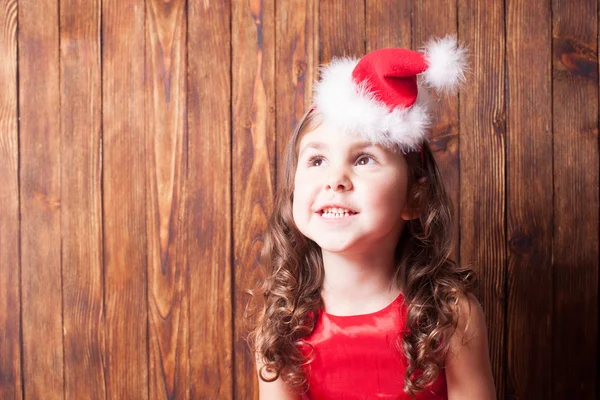 Flicka i Santa hatt pannband — Stockfoto