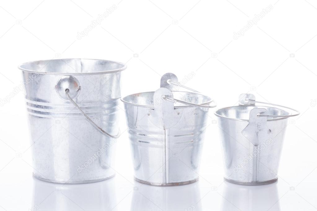 Three metal buckets