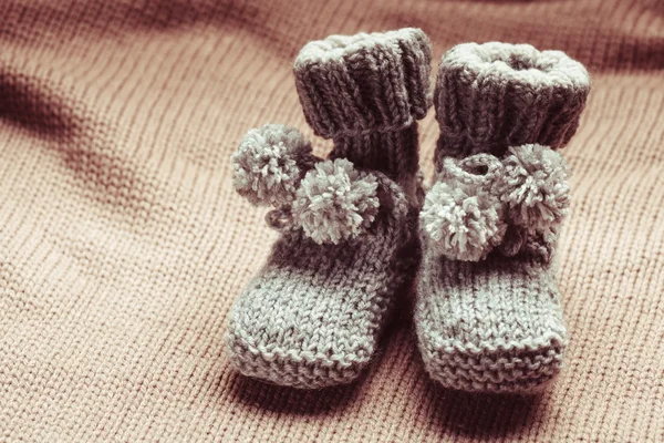 Knitted baby booties — Stock Photo, Image