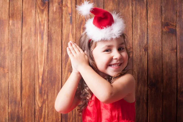 Girl in Santa hat headband — Stock Photo, Image