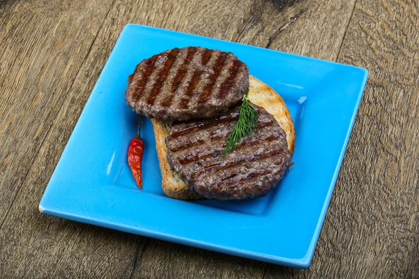 Chuleta de hamburguesa a la plancha —  Fotos de Stock