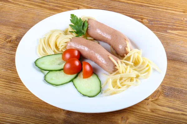 Kids style spaghetti with sausages — Stock Photo, Image