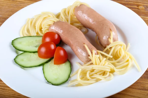 Kids spaghetti with sausages — Stock Photo, Image
