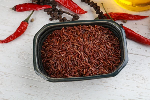 Brown rice in the bowl — Stock Photo, Image