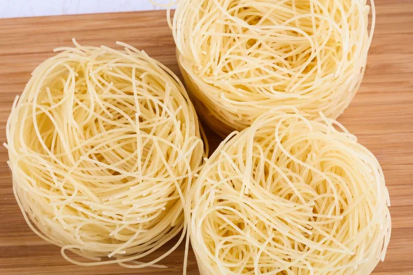 Raw vermicelli ready for cooking — Stock Photo, Image