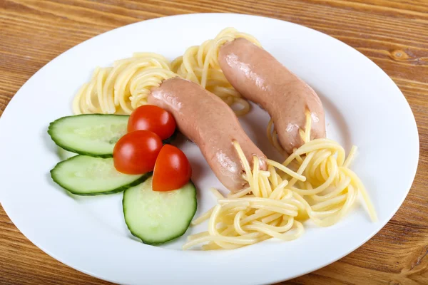 Kids spaghetti with sausages — Stock Photo, Image