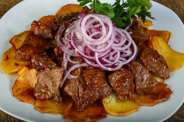 Carne assada com batata — Fotografia de Stock