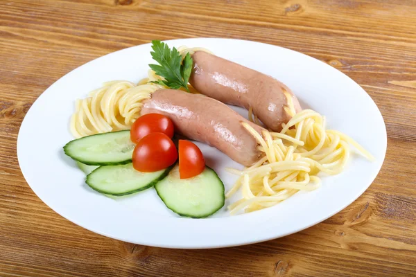 Kids spaghetti with sausages — Stock Photo, Image