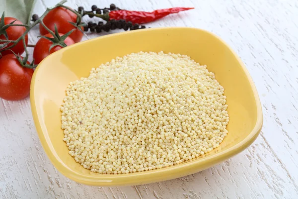 Raw millet ready for cooking — Stock Photo, Image