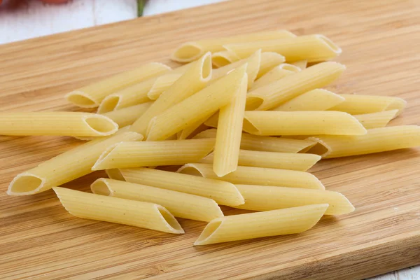 Rå penne pasta — Stockfoto