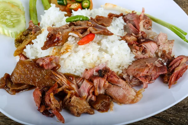 Pork with boiled rice — Stock Photo, Image