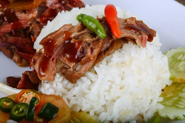 Pork with boiled rice — Stock Photo, Image