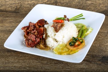 Domuz ile haşlanmış pirinç