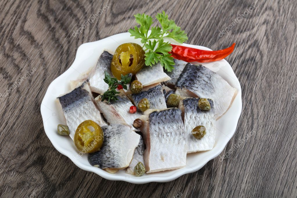 Herring fillet with capers Stock Photo by ©AndreySt 108504384