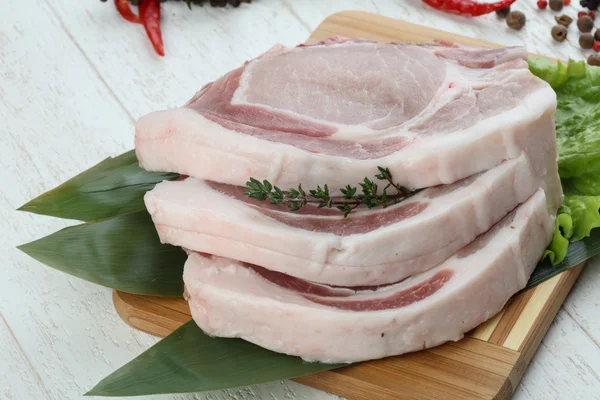 Raw pork t-bone steaks — Stock Photo, Image