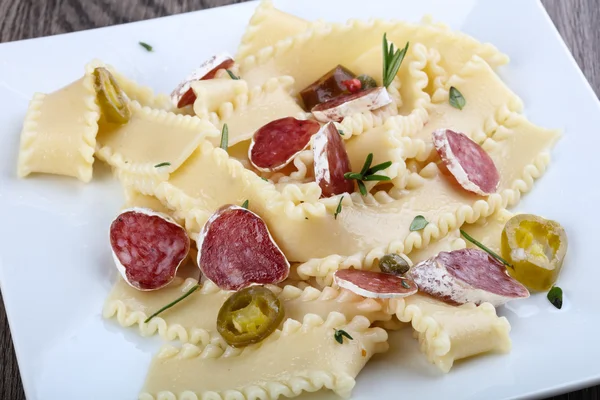 Delicious Pasta with salami — Stock Photo, Image