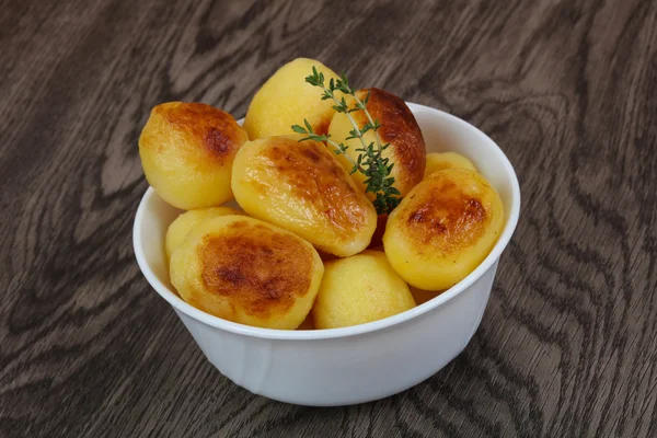 Golden baked potato — Stock Photo, Image