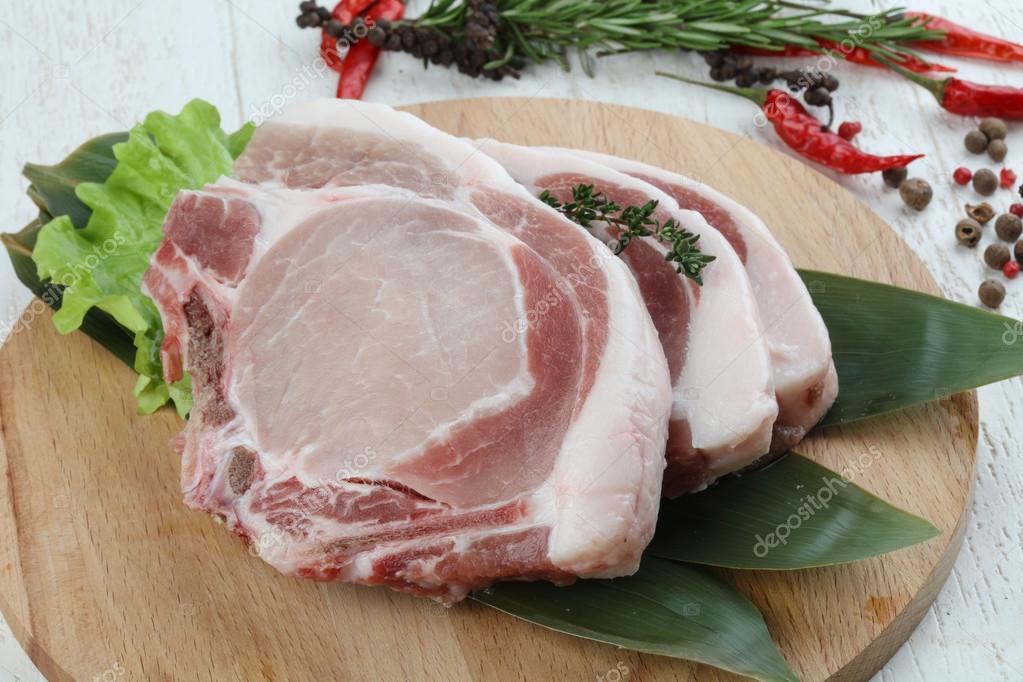 Raw pork tbone steak — Stock Photo © AndreySt 111570888