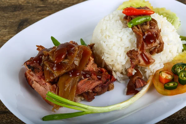 Pork with boiled rice — Stock Photo, Image