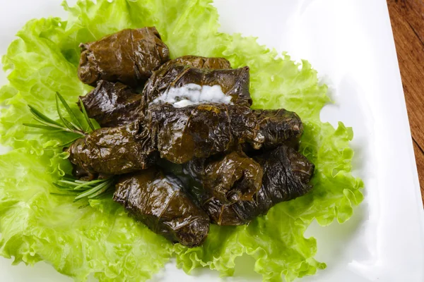 Stuffed meat in grape leaves — Stock Photo, Image