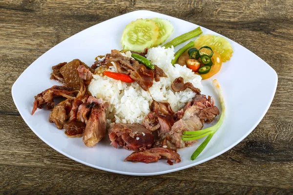 Pork with boiled rice — Stock Photo, Image