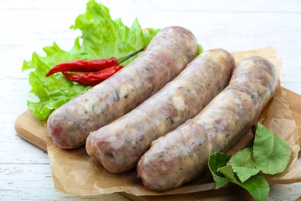 Yemek pişirmek için çiğ sosis