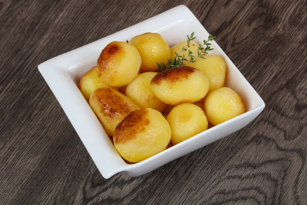 Golden baked potato — Stock Photo, Image