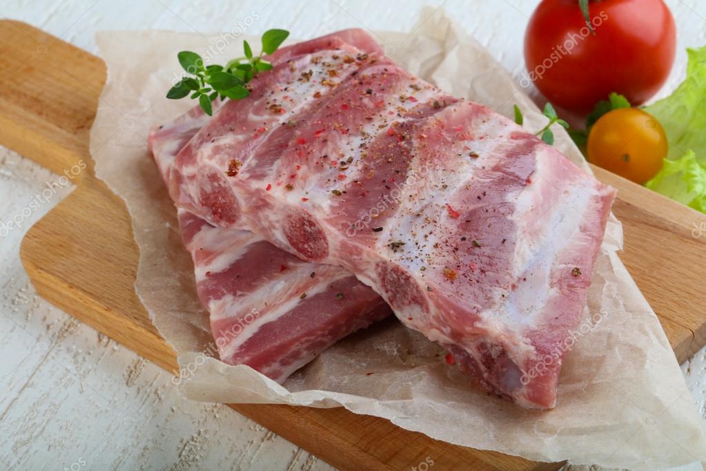 Raw pork ribs Stock Photo by ©AndreySt 118741196