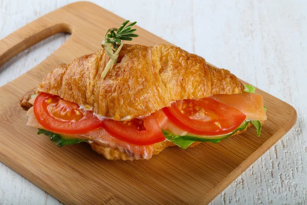 Croissant with salmon — Stock Photo, Image