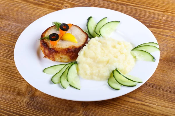 Kids style cutlet with mushed potato — Stock Photo, Image